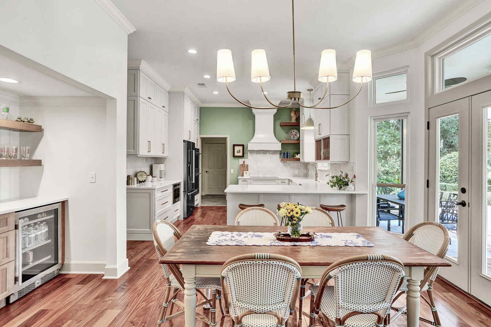 bright transitional kitchen dining area island view