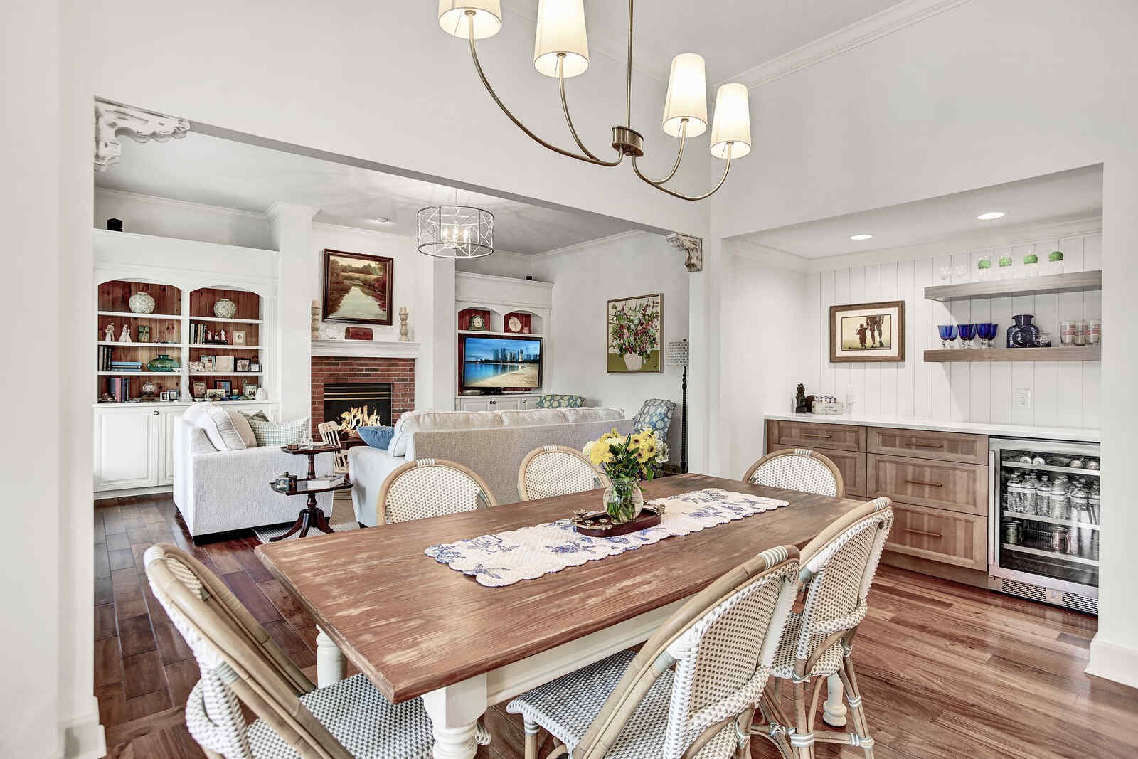 bright transitional kitchen dining living room fireplace