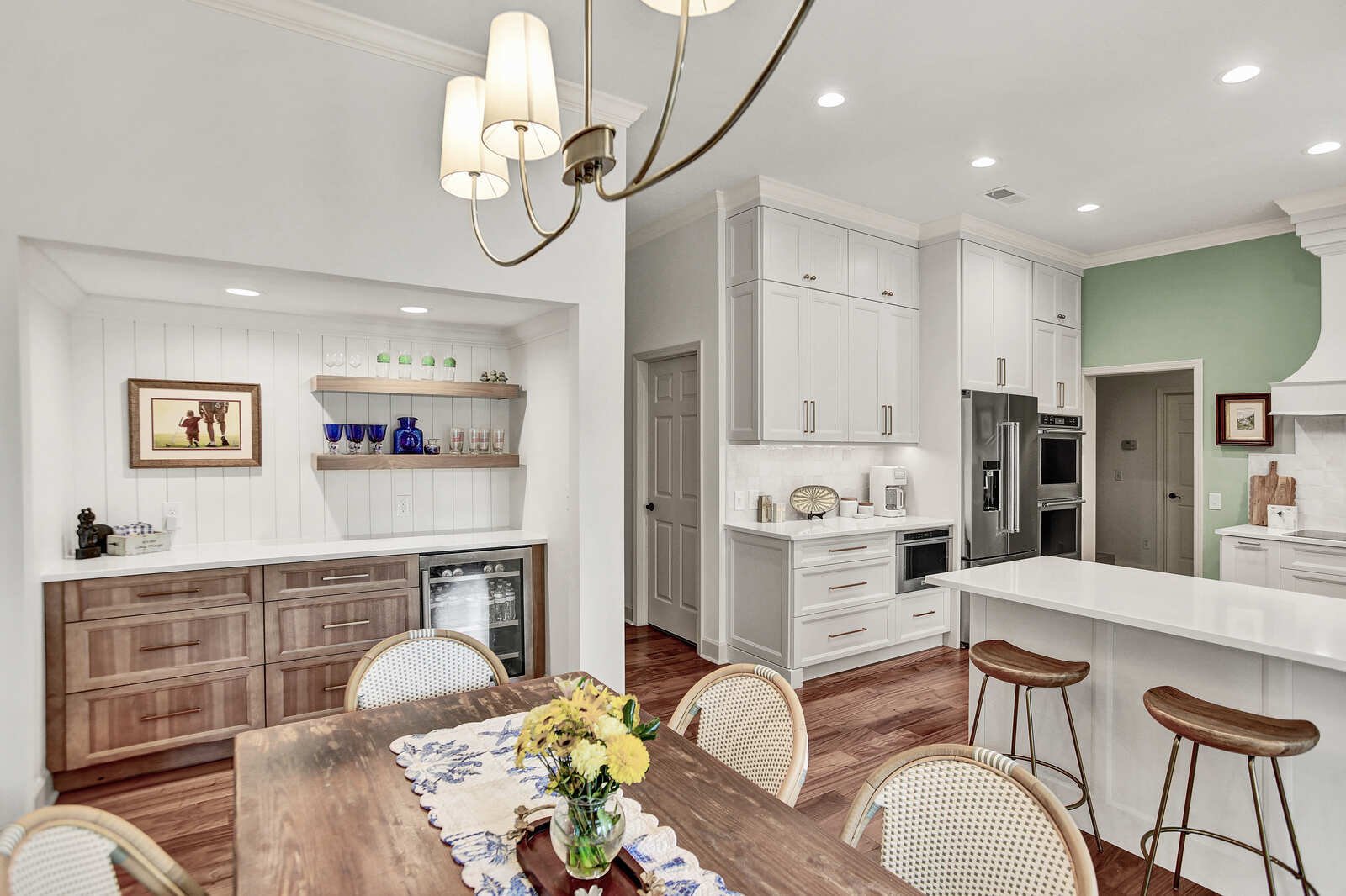 bright transitional kitchen dining view wet bar