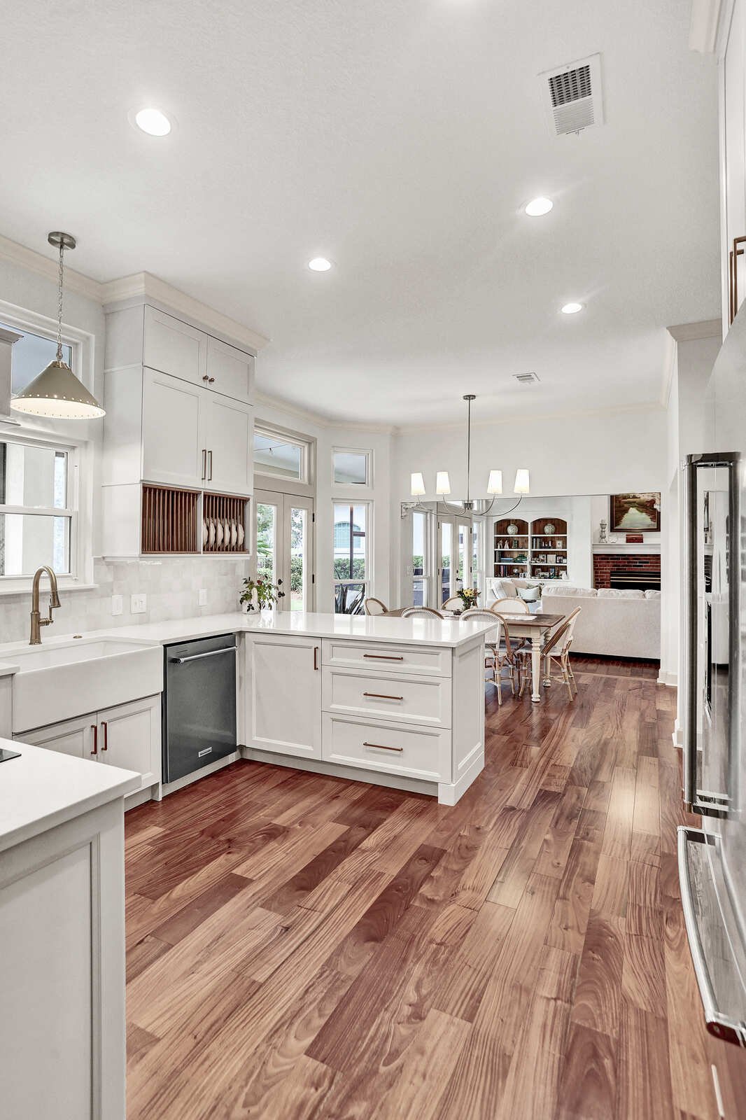 bright transitional kitchen island sink view living room