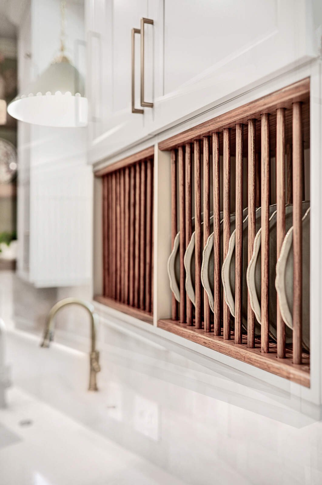 bright transitional kitchen plate rack detail