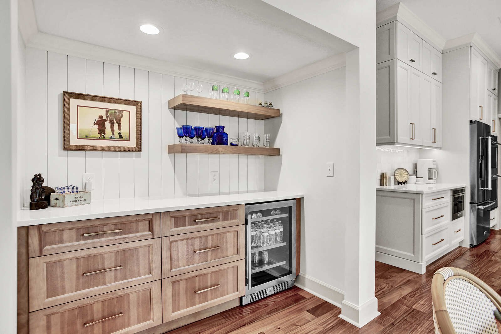 bright transitional kitchen wet bar open shelves