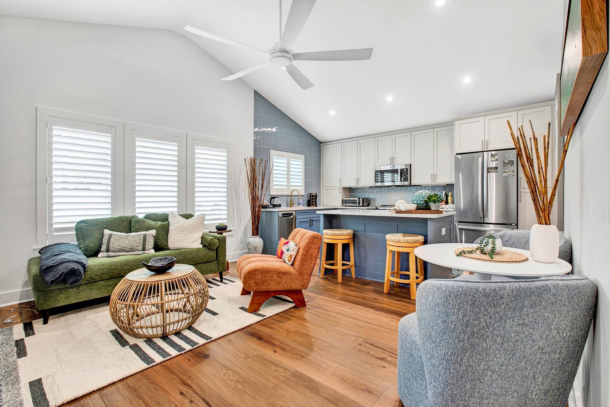 Beach Bungalow with Bright Furniture, Ecclectic Furniture and Kitchen Island with Seating by BeeTree Homes in Jacksonville, FL Beach Bungalow with Bright Furniture, Ecclectic Furniture and Kitchen Island with Seating by BeeTree Homes in Jacksonville, FL