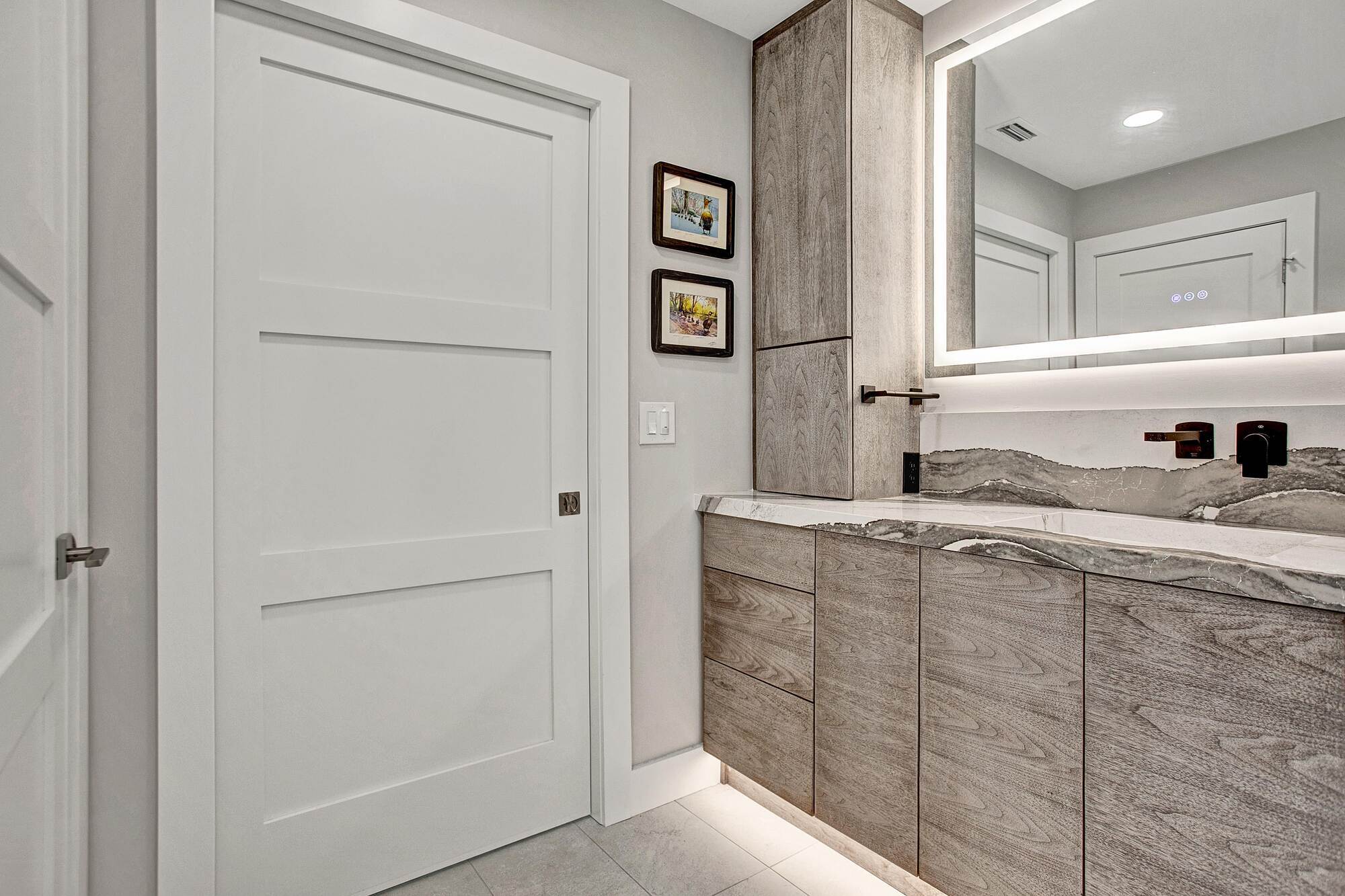 contemporary bathroom vanity with wood cabinets and quartz countertop in BeeTree Homes Jacksonville FL contemporary bathroom vanity with wood cabinets and quartz countertop in BeeTree Homes Jacksonville FL