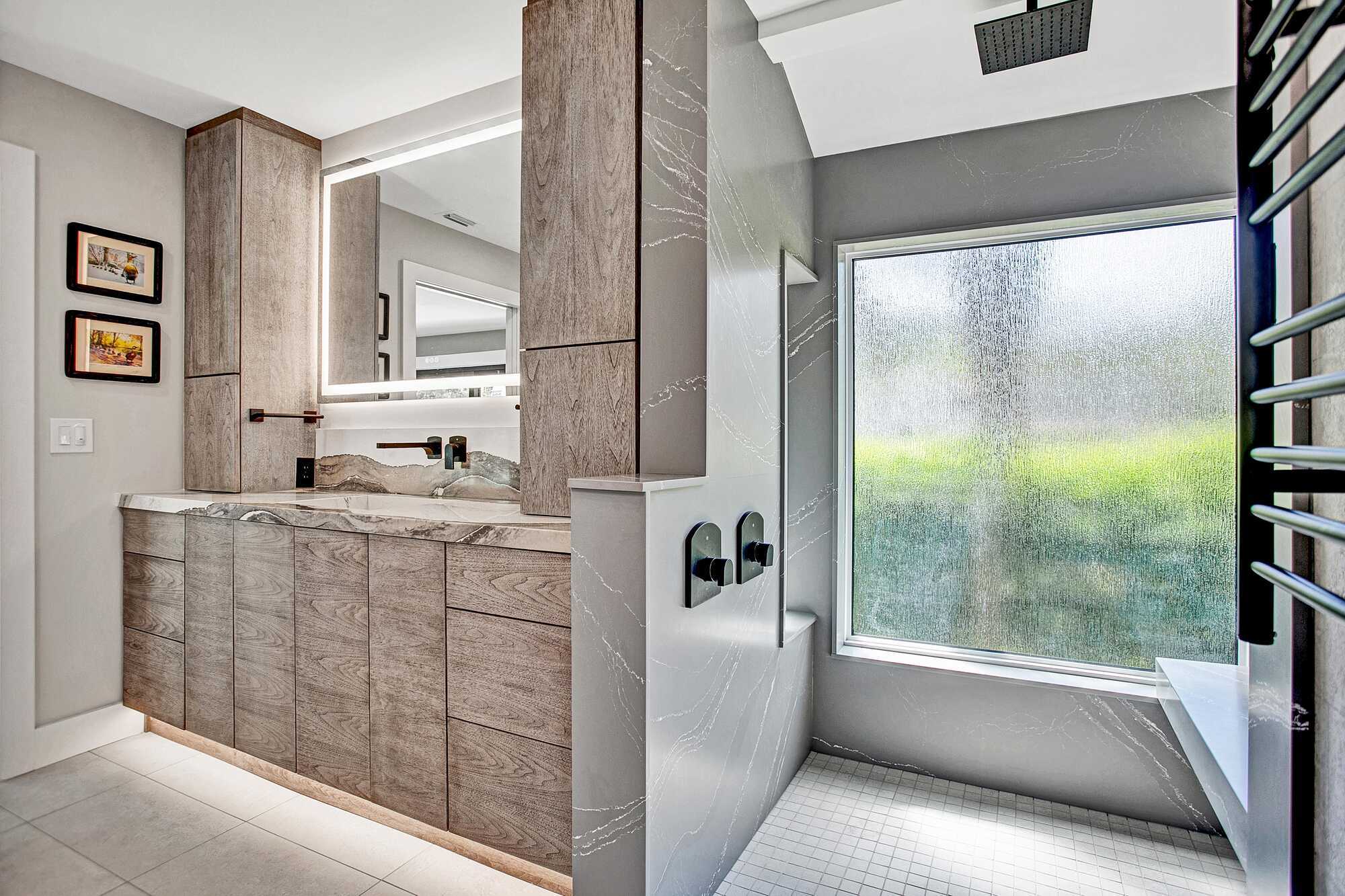luxury bathroom remodel style with quartz vanity and large window shower by BeeTree Homes in Ponte Vedra Beach FL luxury bathroom remodel style with quartz vanity and large window shower by BeeTree Homes in Ponte Vedra Beach FL