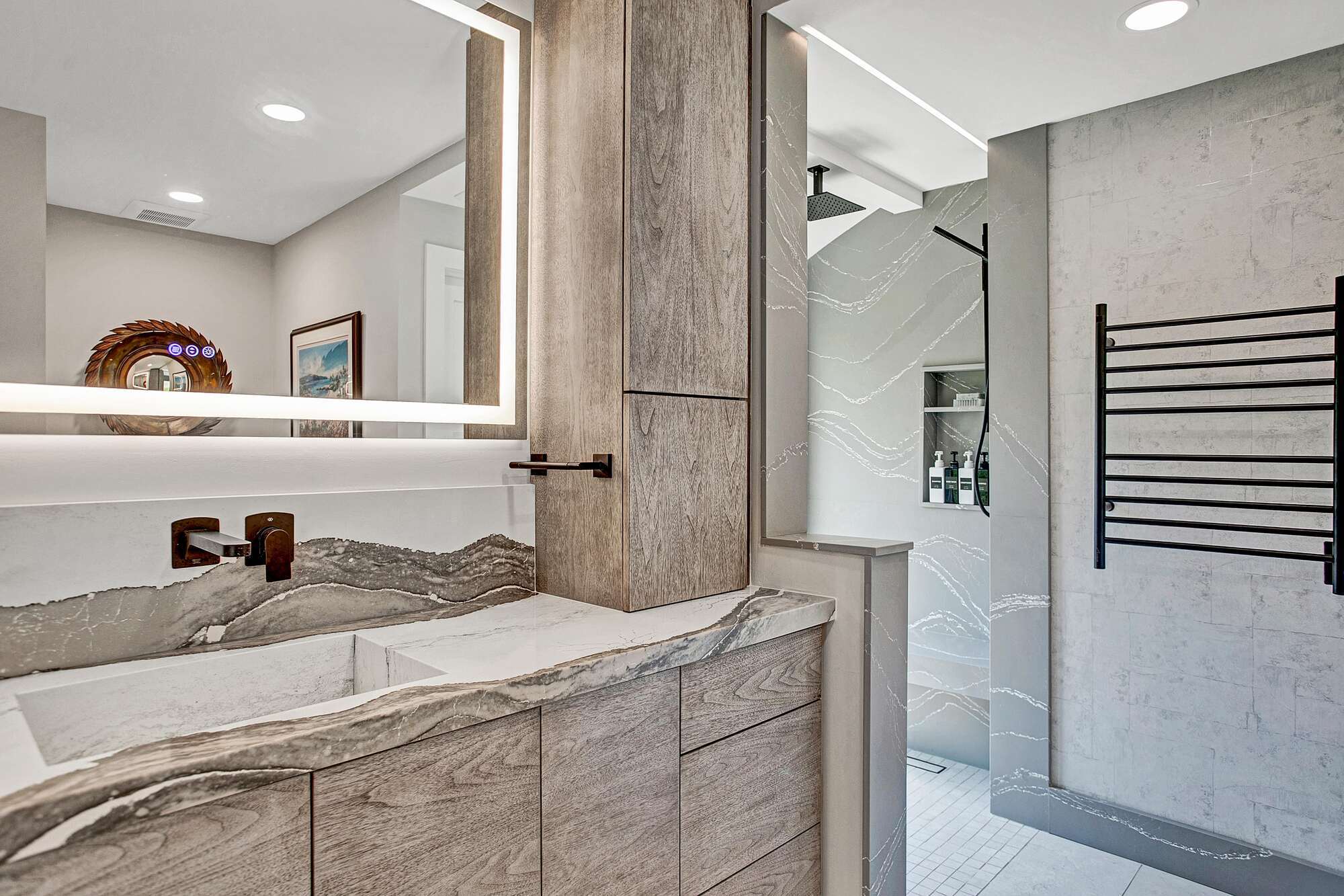 luxury bathroom with textured tile shower and quartz vanity by BeeTree Homes in Jacksonville Beach FL