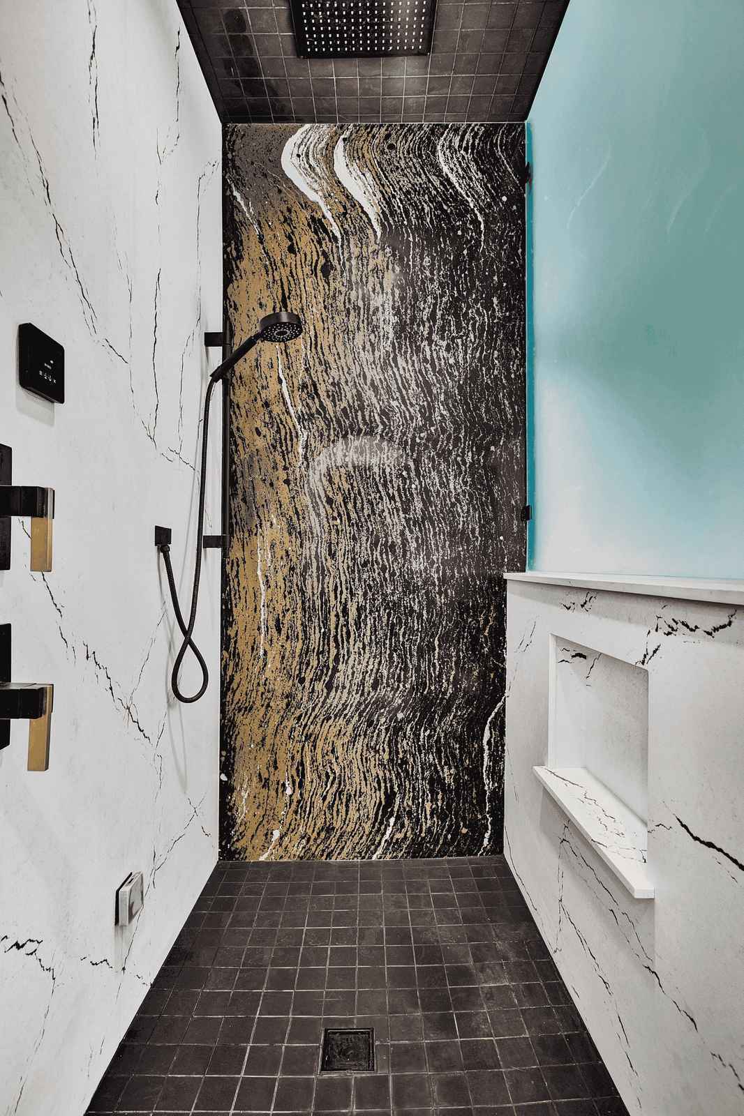 large walk in shower with frosted glass
