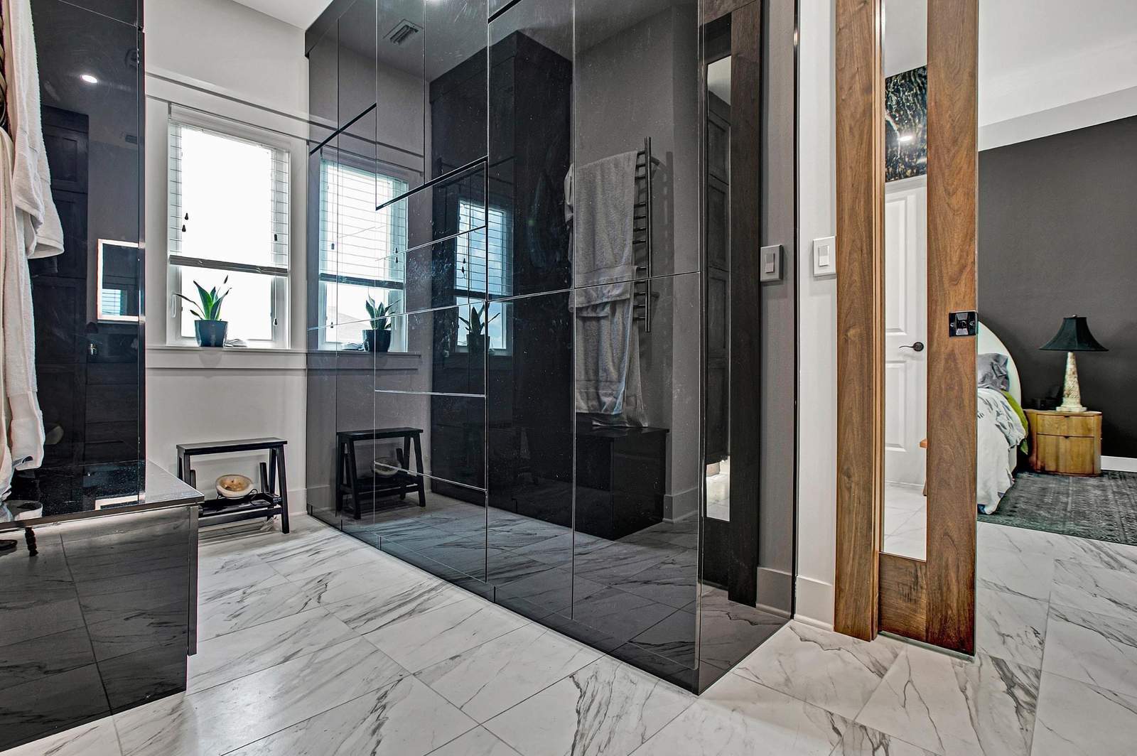 luxury master bathroom remodel in jacksonville  fl with dark tile