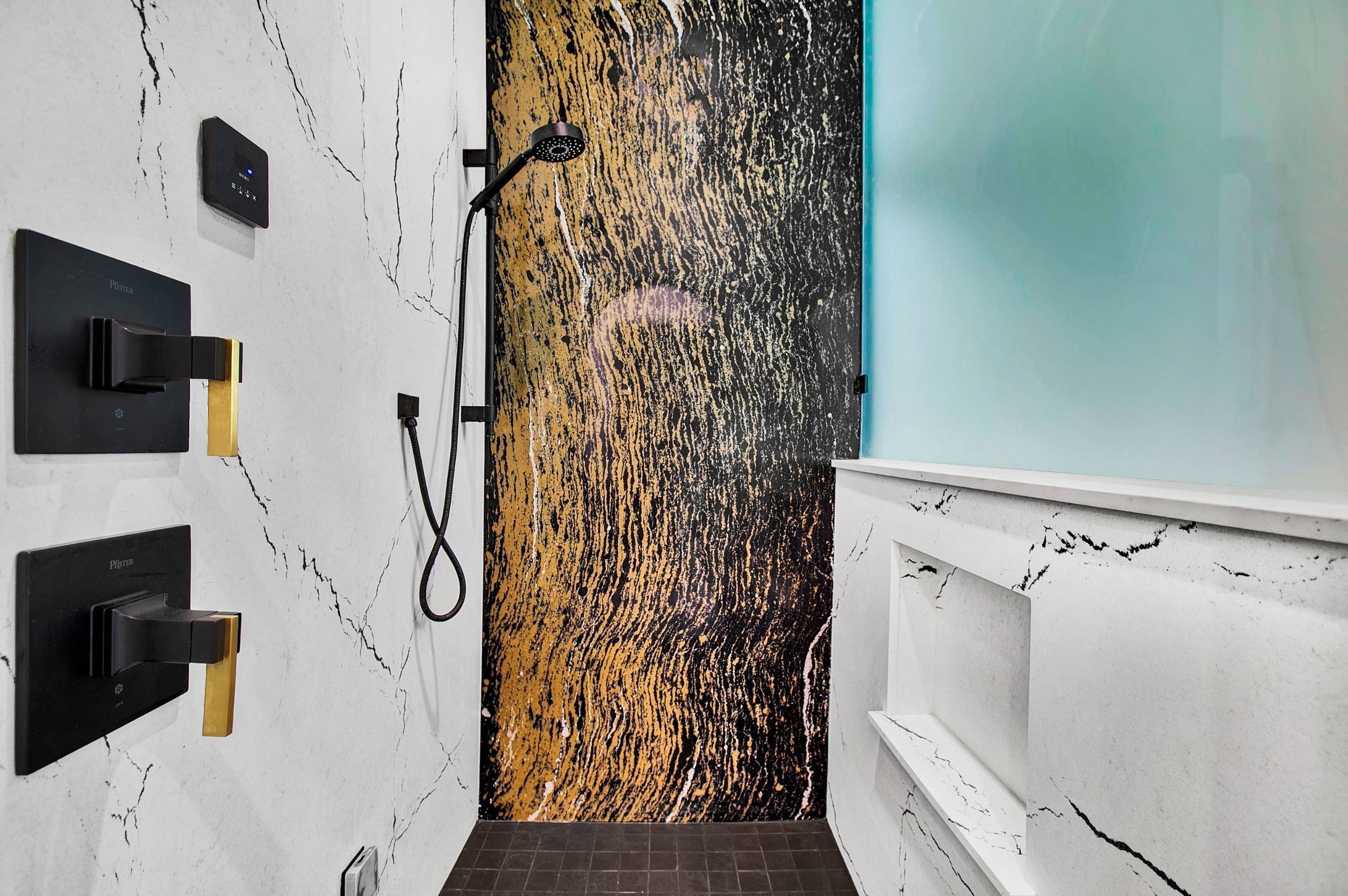 luxury walk in shower renovation in jacksonville with black hardware