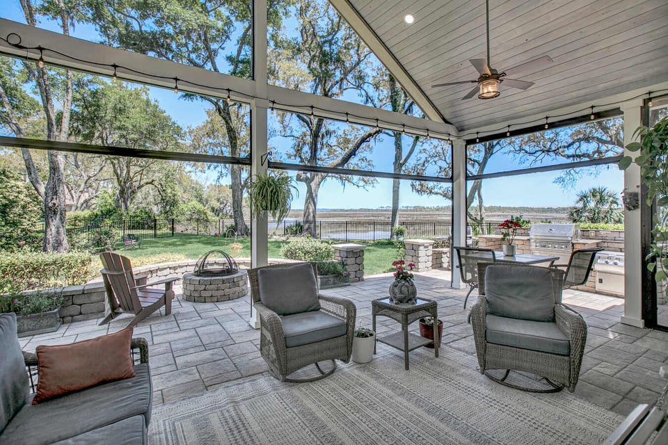 Scenic outdoor living area overlooking water in custom home by BeeTree Homes, Jacksonville, FL