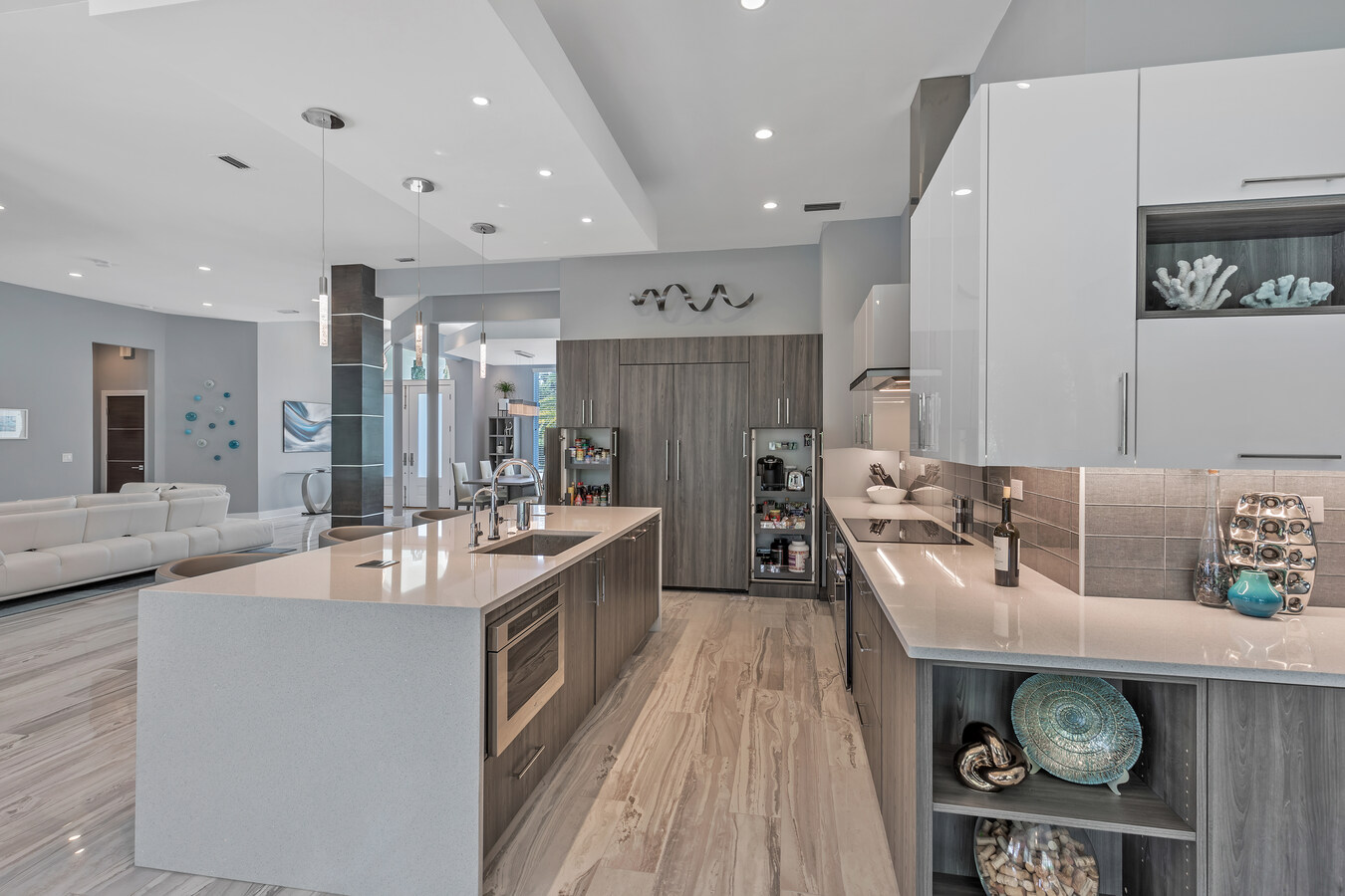 Open kitchen concept with modern finishes in a BeeTree Homes custom home in Jacksonville, FL