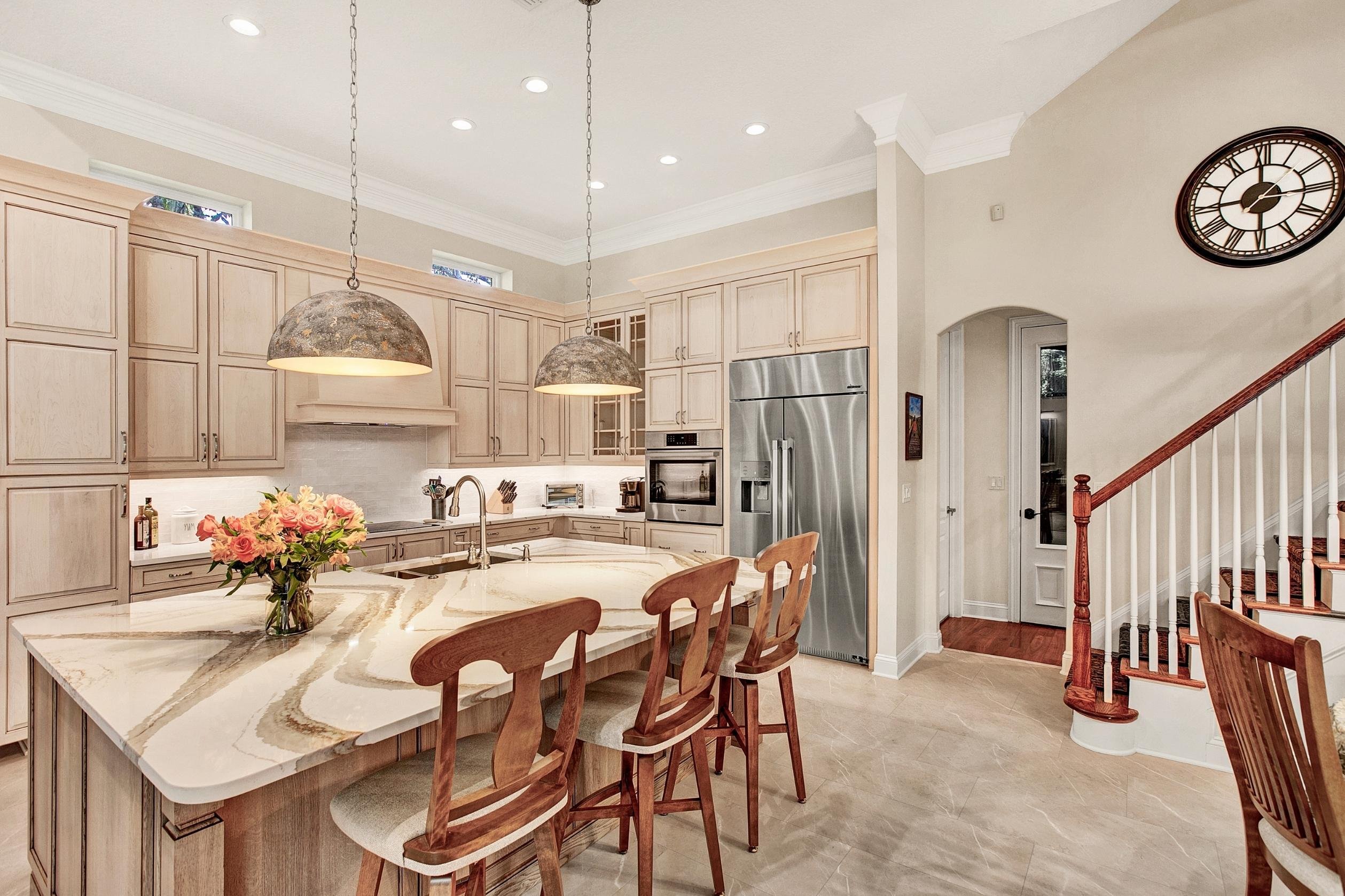 kitchen remodel in queens harbor with stainless steel fridge