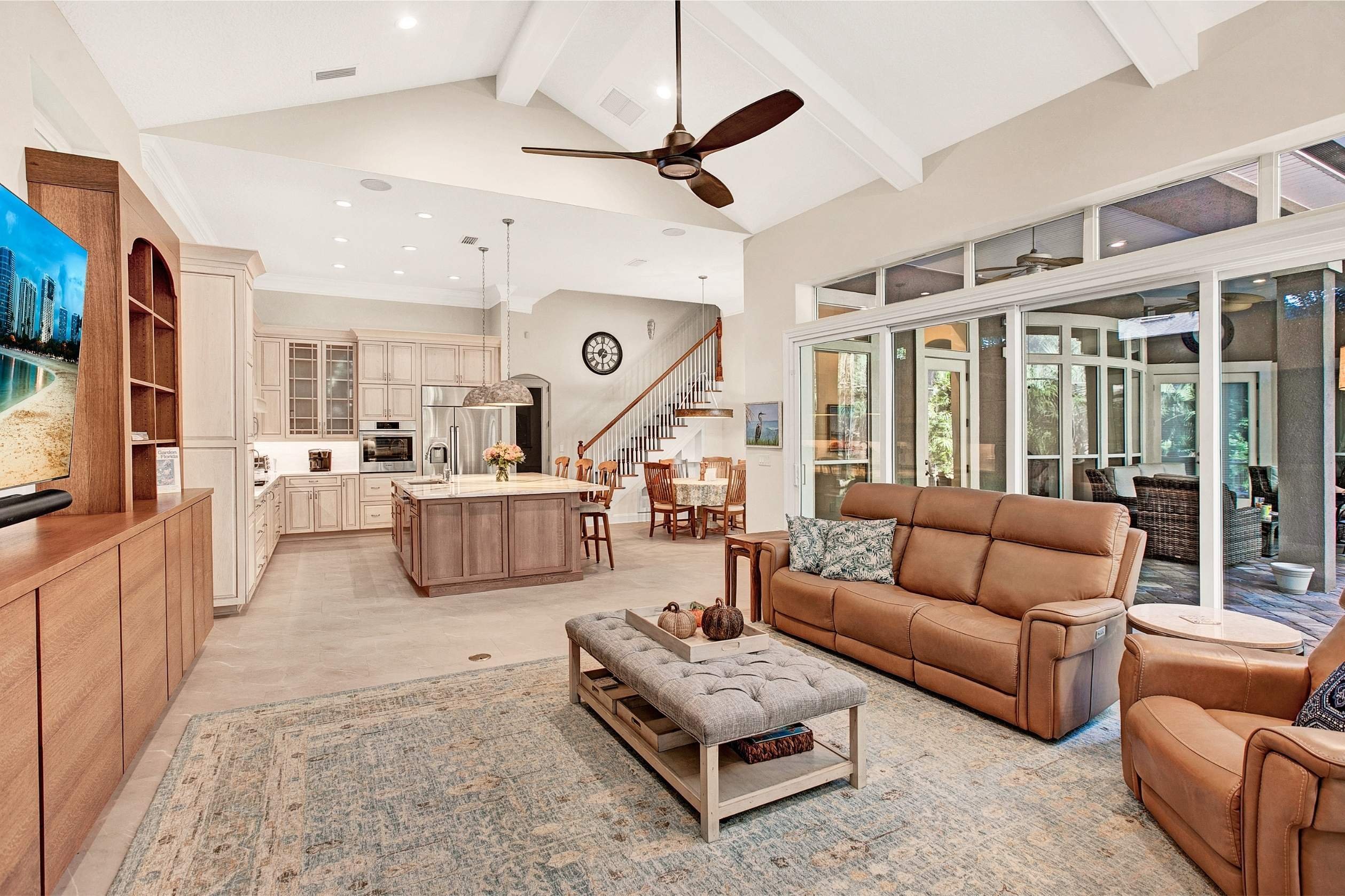living room with sliding doors to outdoors in a queens harbor remodel