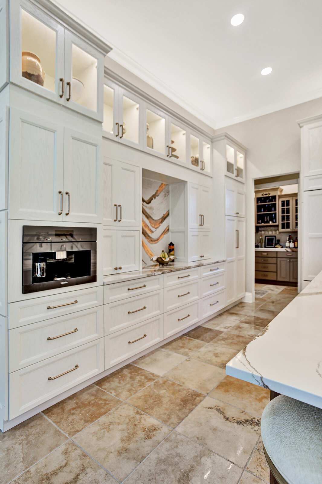 golden contemporary kitchen butlers pantry glass cabinets hallway