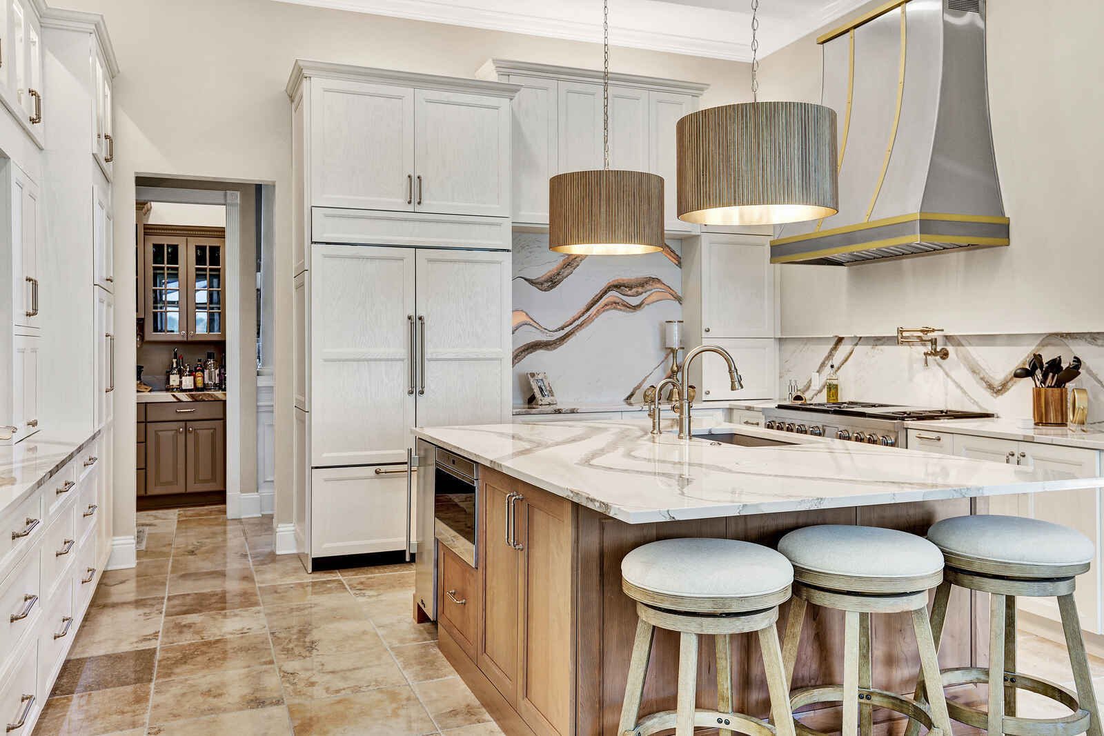 golden contemporary kitchen island gold range hood bar stools