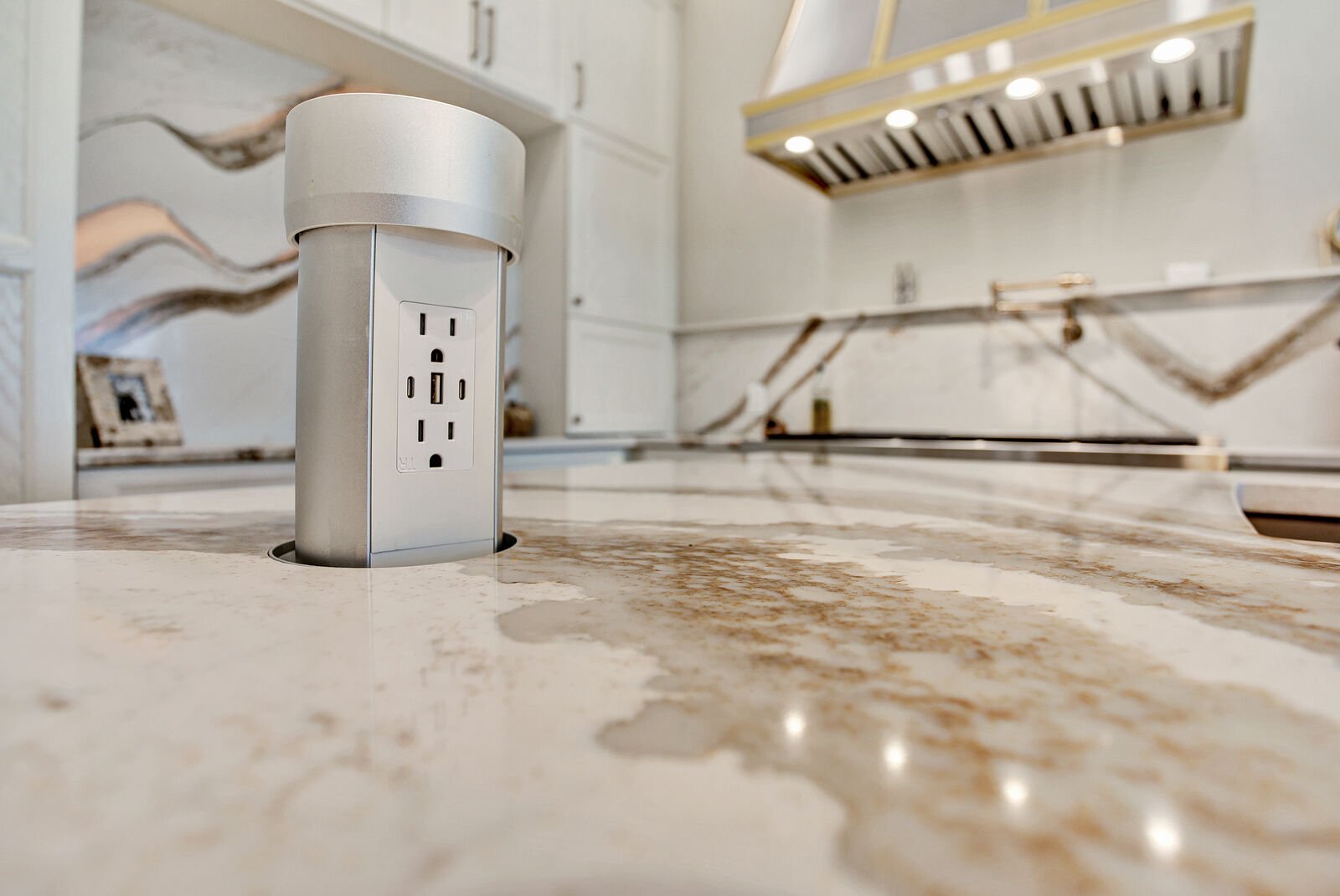 golden contemporary kitchen island pop-up outlet usb charger