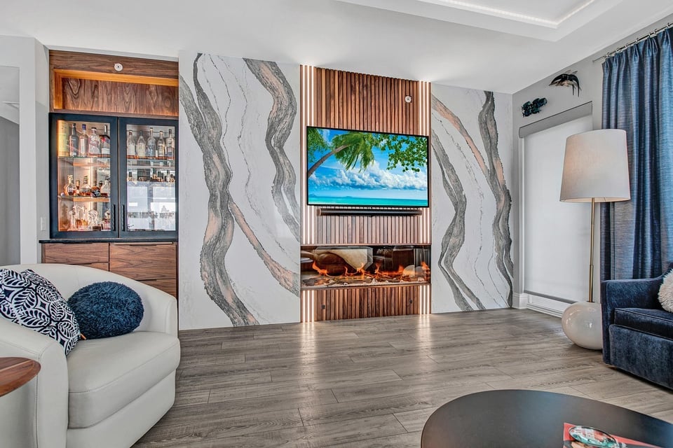 luxury condo renovation with custom marble slab fireplace in jacksonville fl