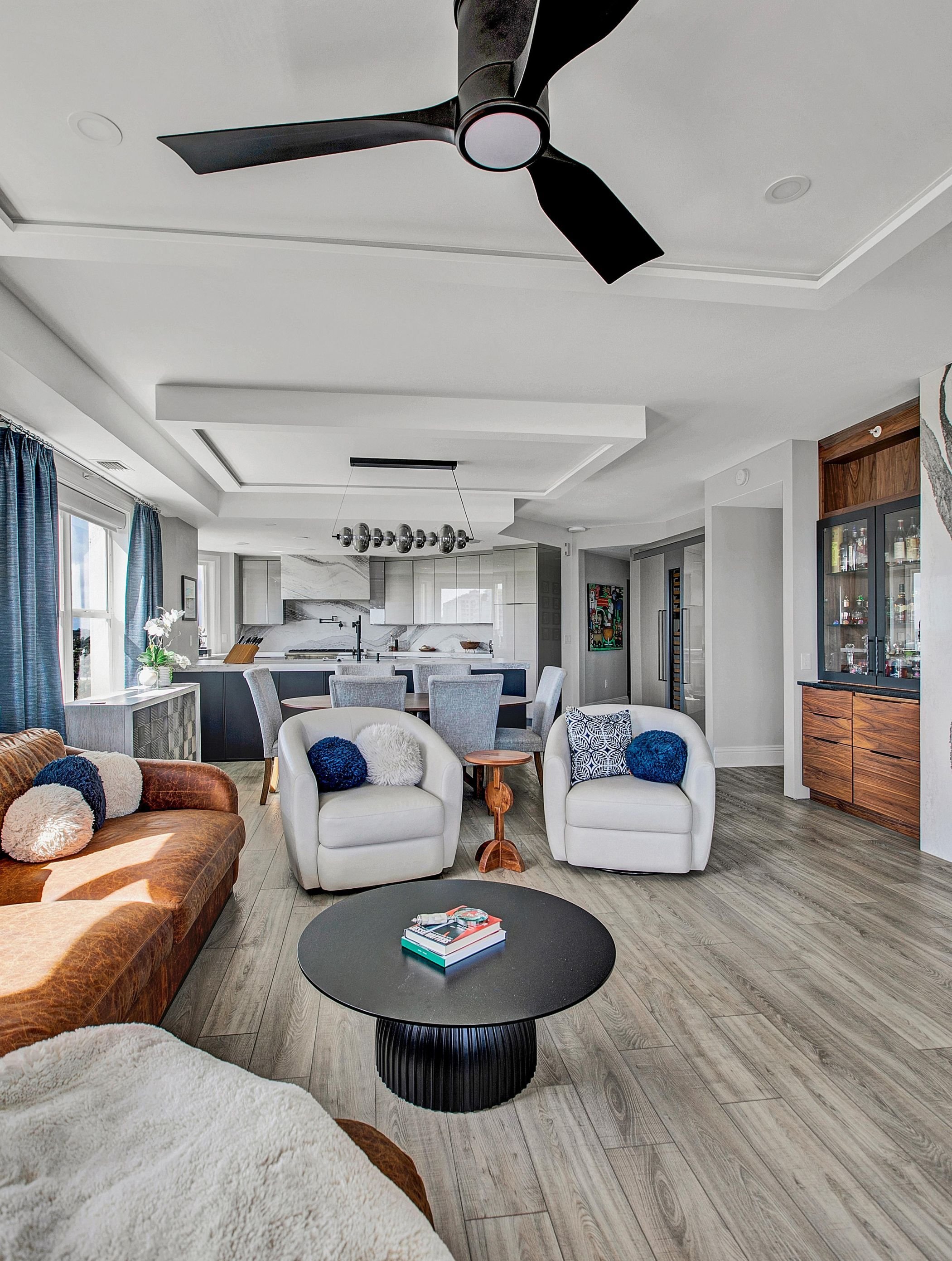 condo renovation with open concept layout and tray ceilings in jax beach