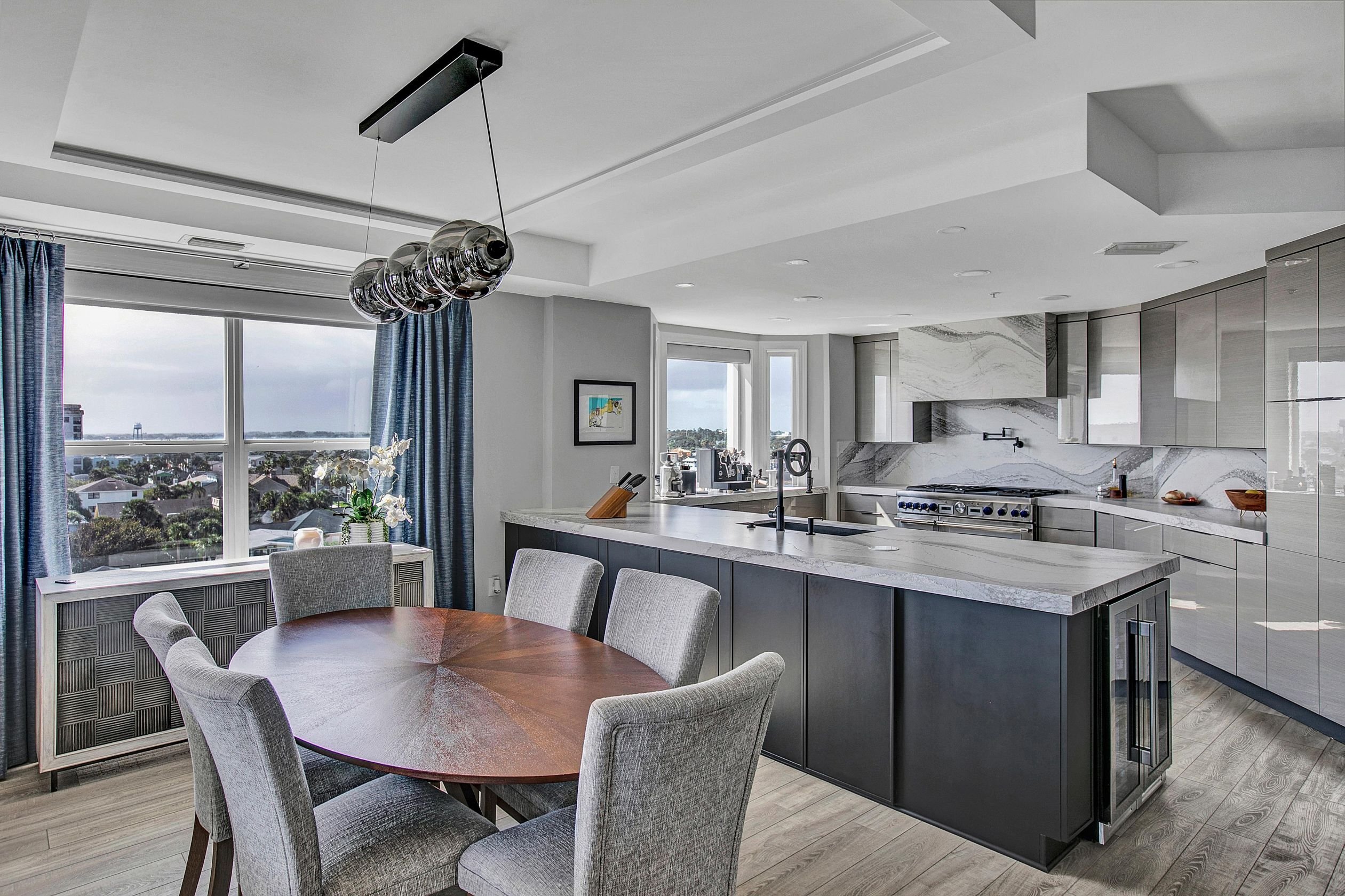 gray and white kitchen and dining area