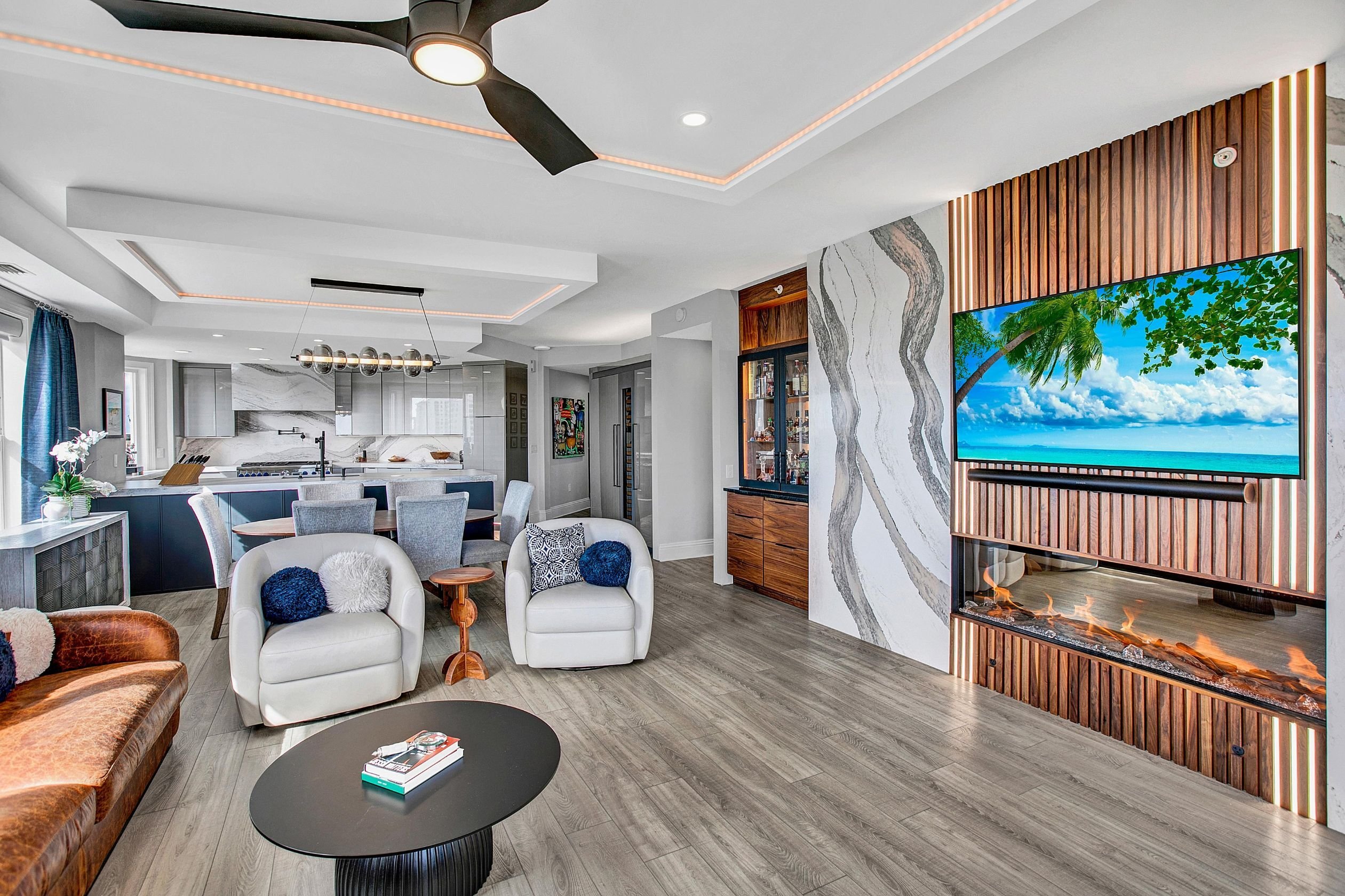 statement stone slab in living area of luxury condo with tray ceilings in jax beach