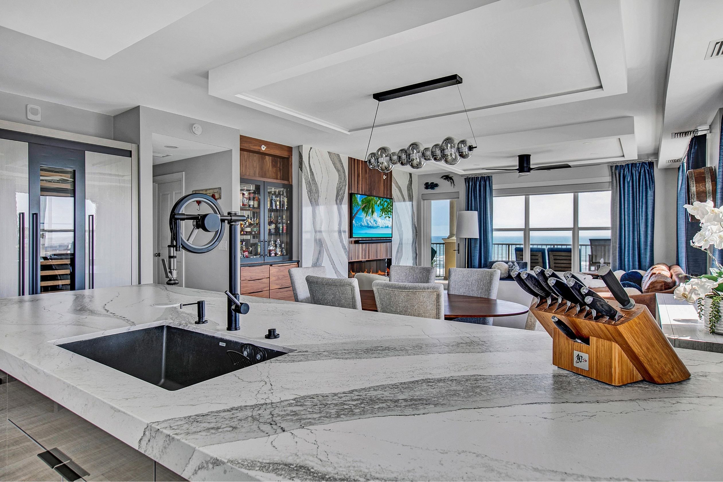 view from kitchen into open floorplan jax beach condo remodel