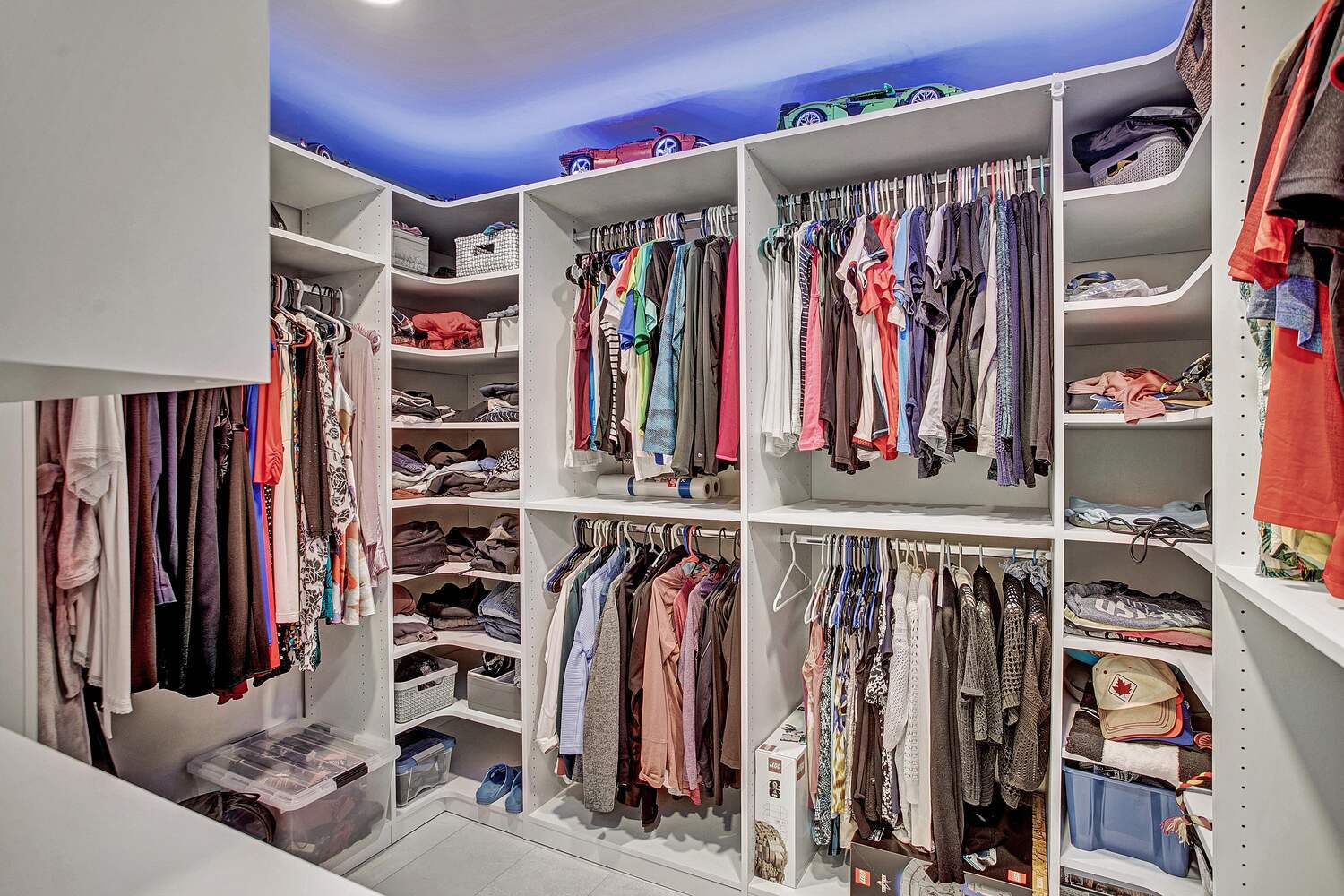 built-in closet organization system with LED lighting by BeeTree Homes in Queens Harbour FL