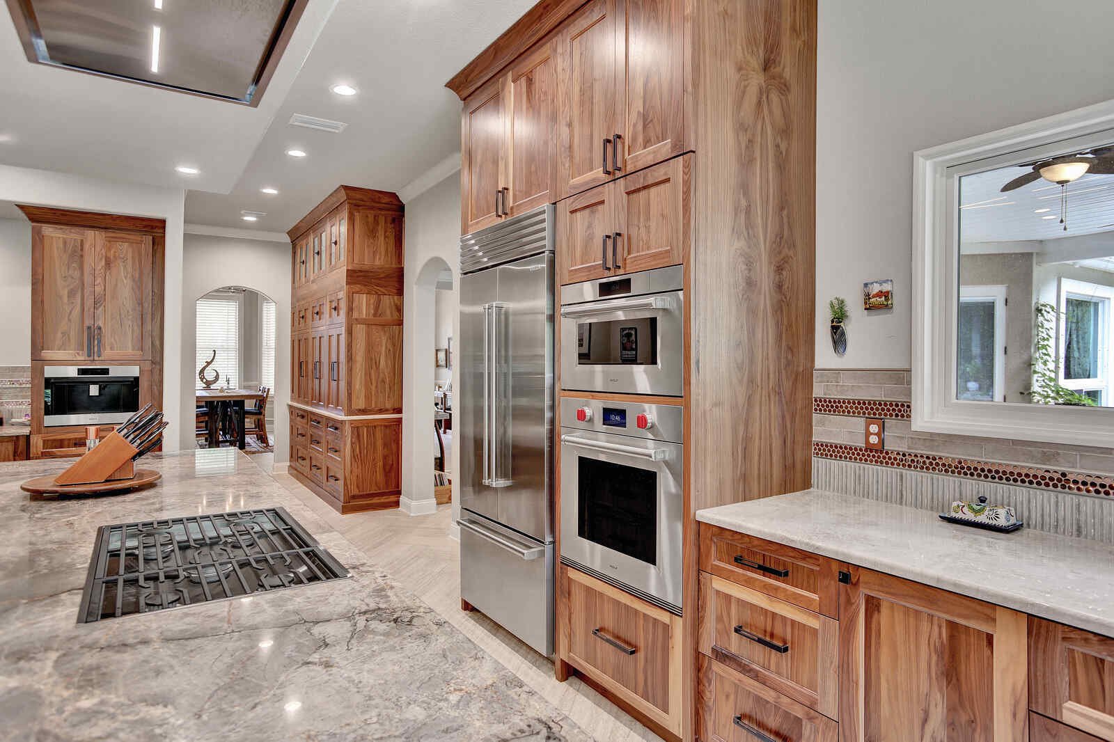 eclectic whole home remodel kitchen island view with gas top range