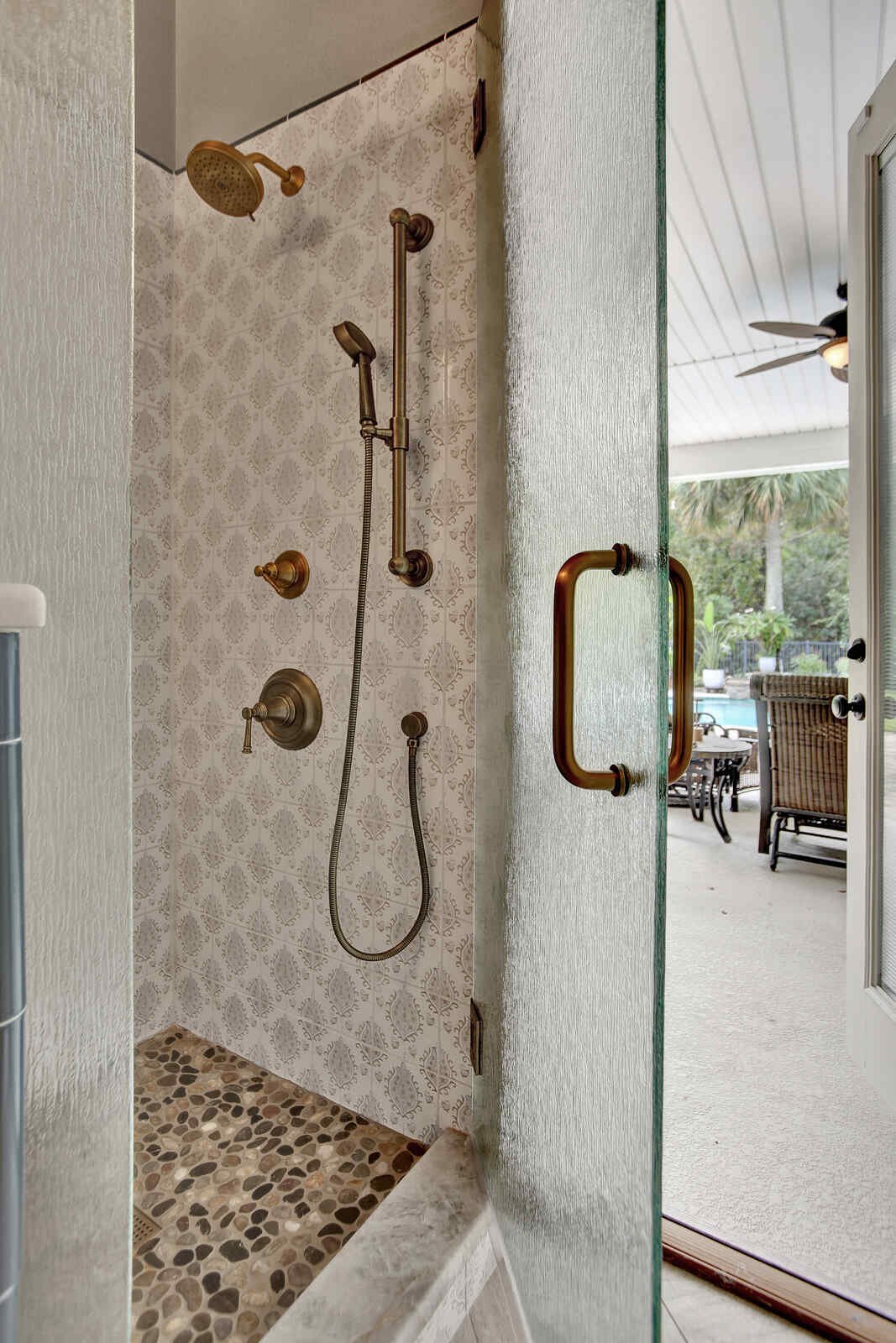 eclectic whole home remodel shower fixtures overlooking backyard