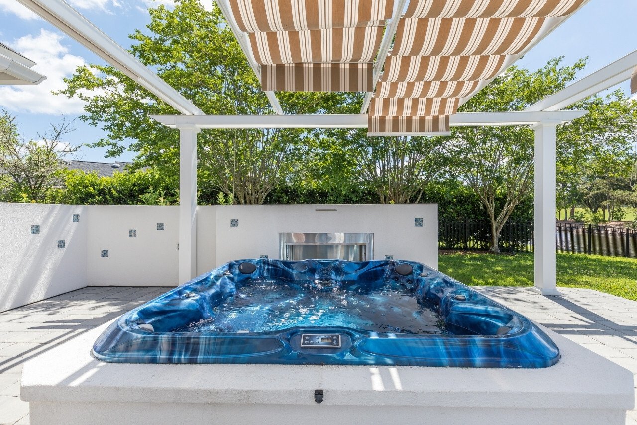 hot tub with shade cover from a pergola  (1)