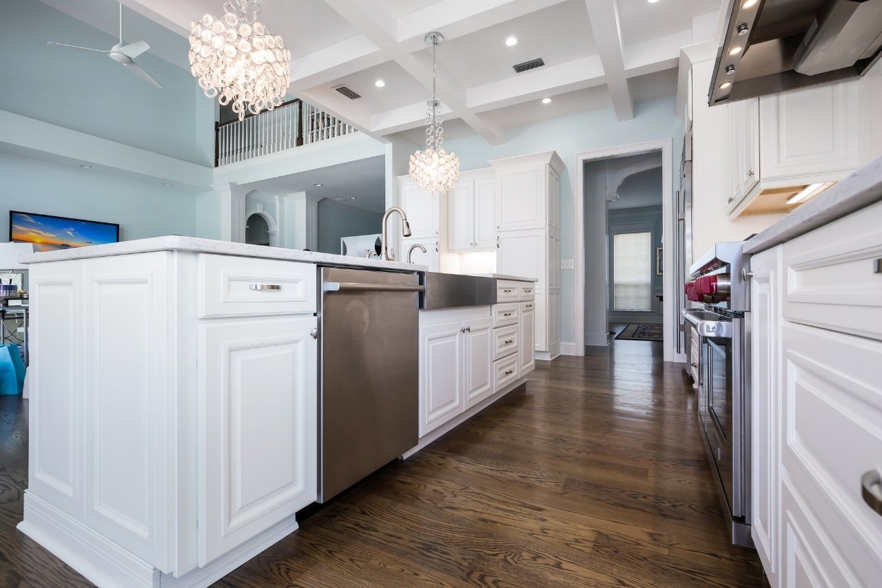 kitchen remodel with white countertops and medium hardwood floors (1)