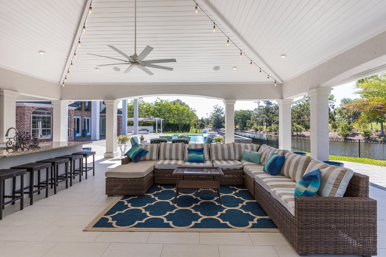 large covered porch in florida with outdoor sectional seating (1)
