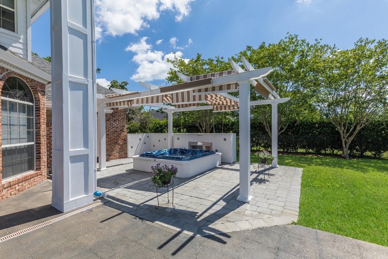 pergola over a hot tub in a florida outdoor living remodel (1)