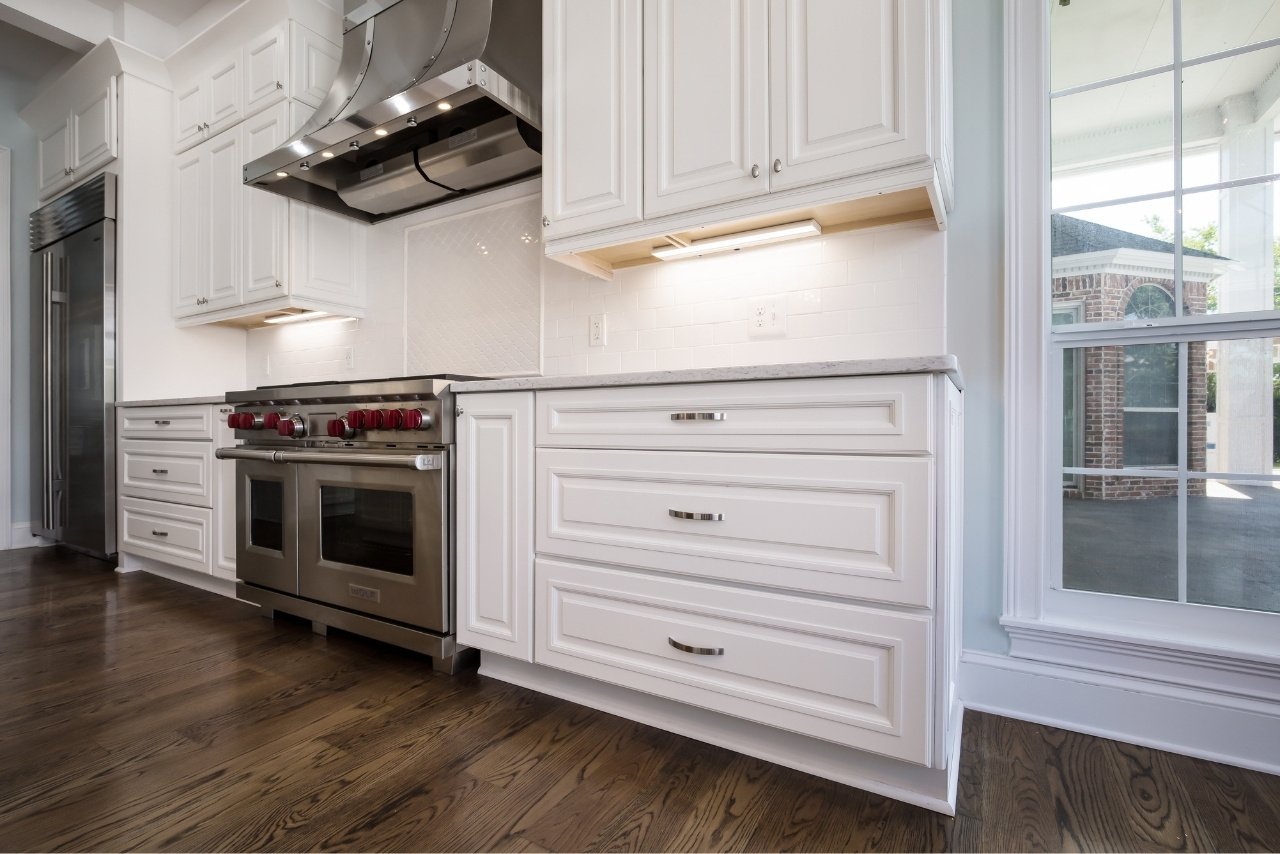 white cabinets and stainless steel appliances in a sawgrass kitchen renovation (1)