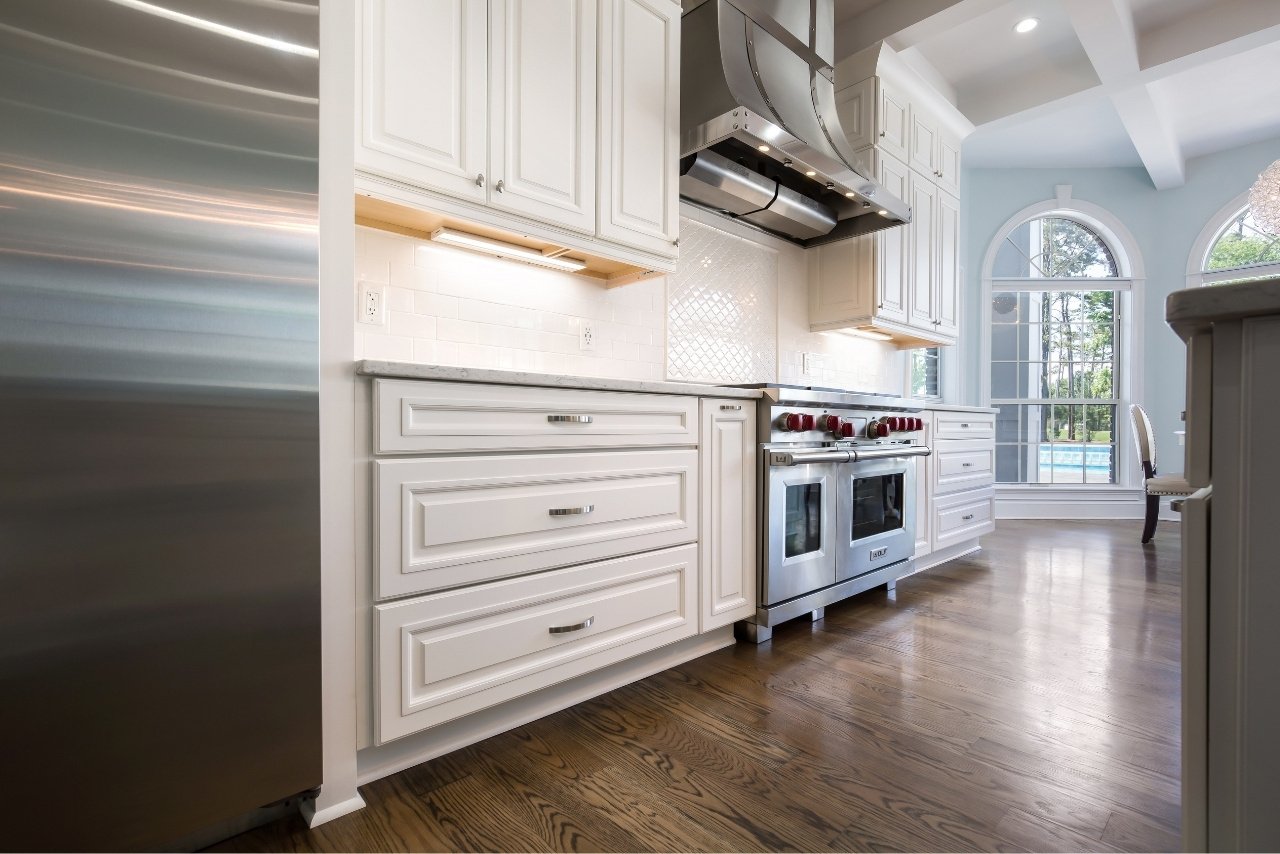 white kitchen remodel with under cabinet lighting (1)